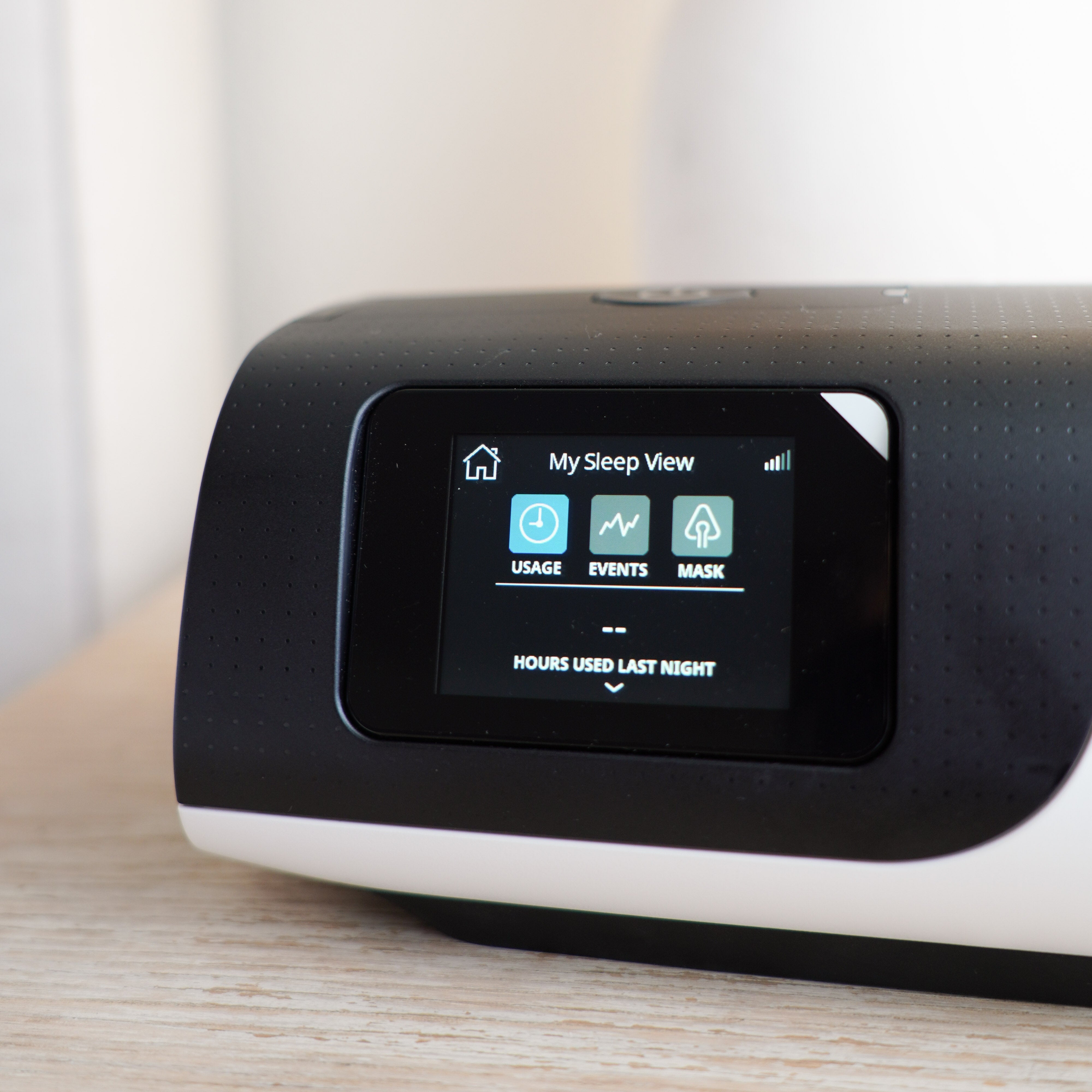 Front view of the AirSense 11 showing the crystal clear LED touch screen